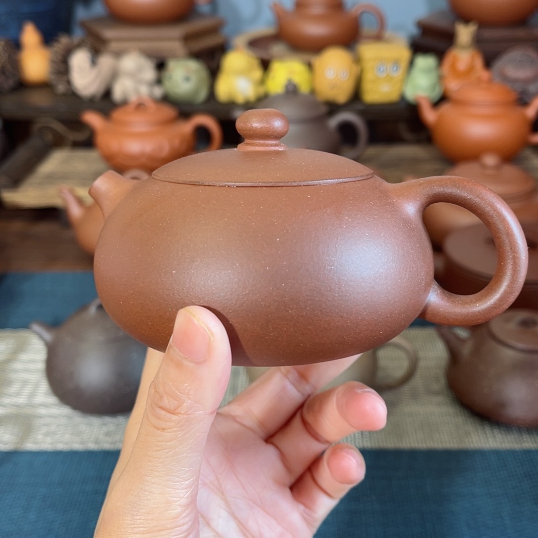 紫砂茶壶勇**心微瑕精工半手零添加