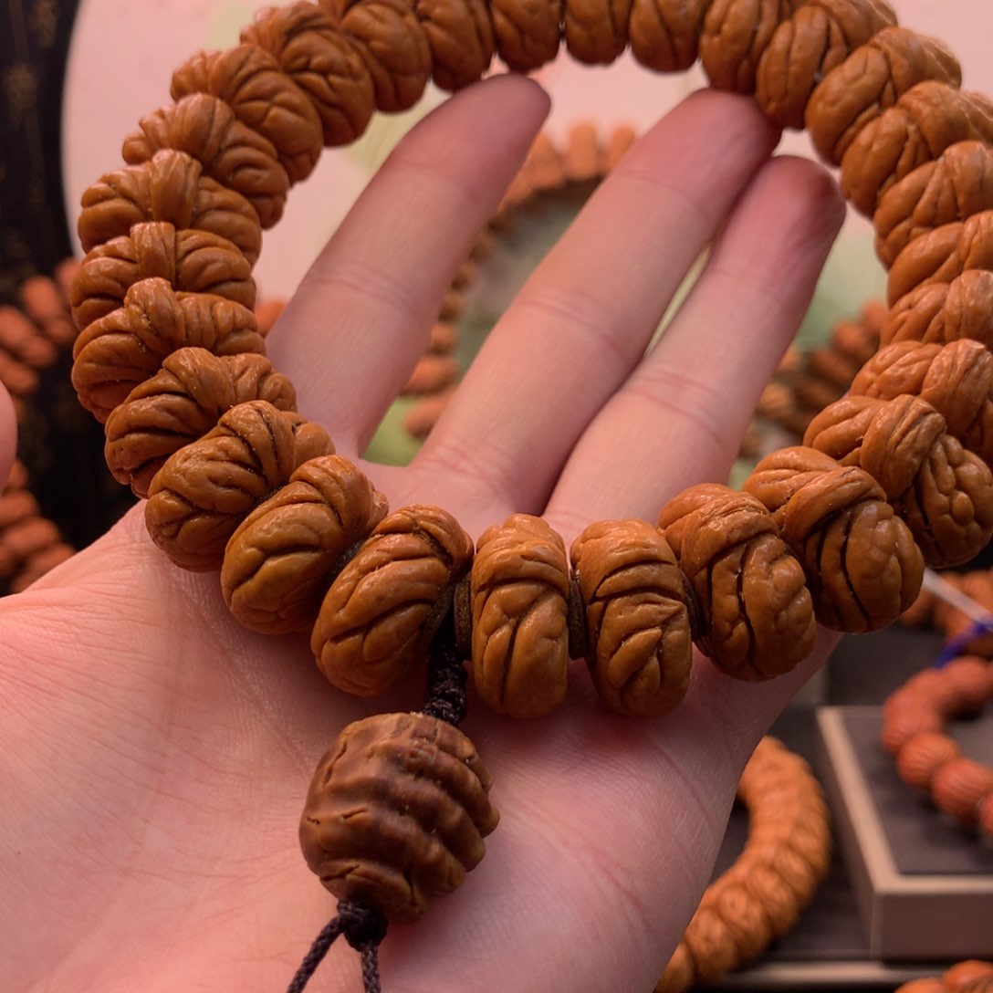 【闪购商品】桃核手串_****23霸王龙手持