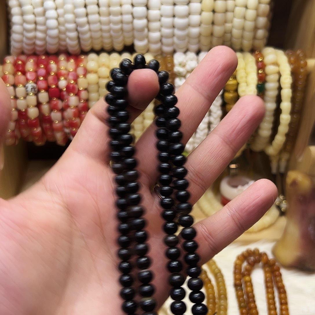 慕***寒把件桃核0.8黑驴蹄子108