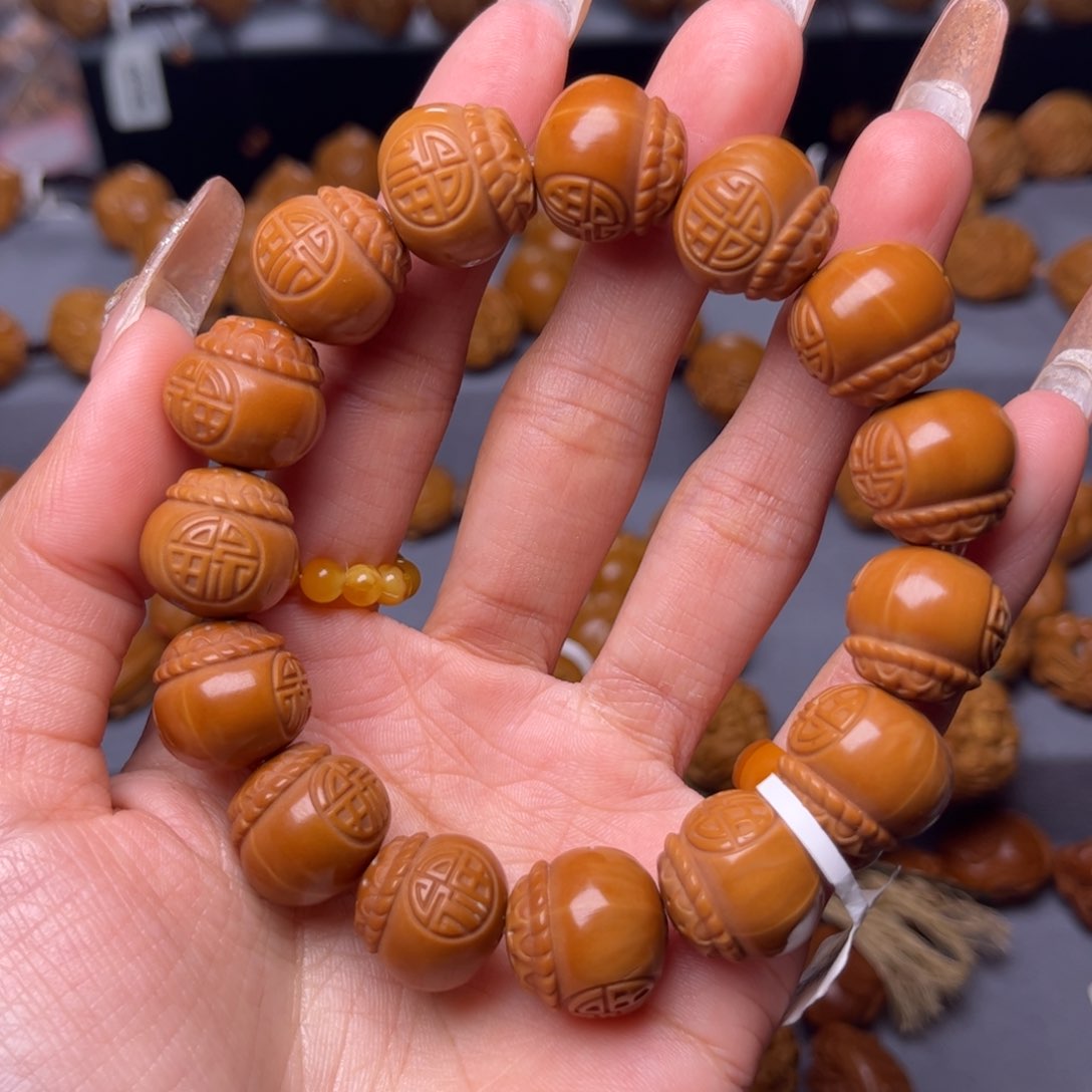 橄榄核吊坠小****?橄榄核手串