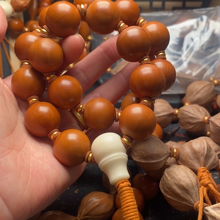 手串/手链橄榄核2.0正圆光珠手持大流苏