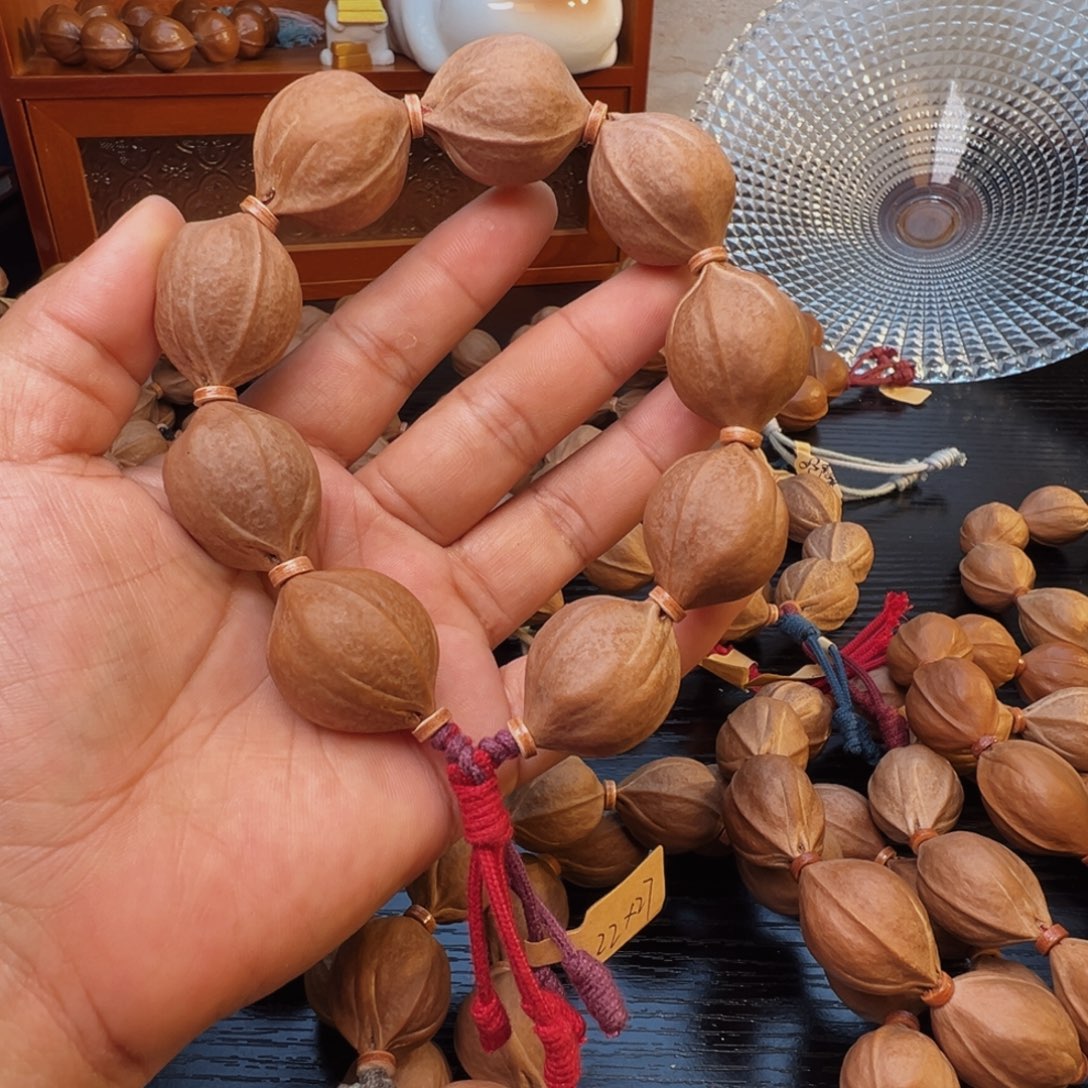 刘***仔橄榄核手串梅林铁核鲨鱼背22×27+三通素串