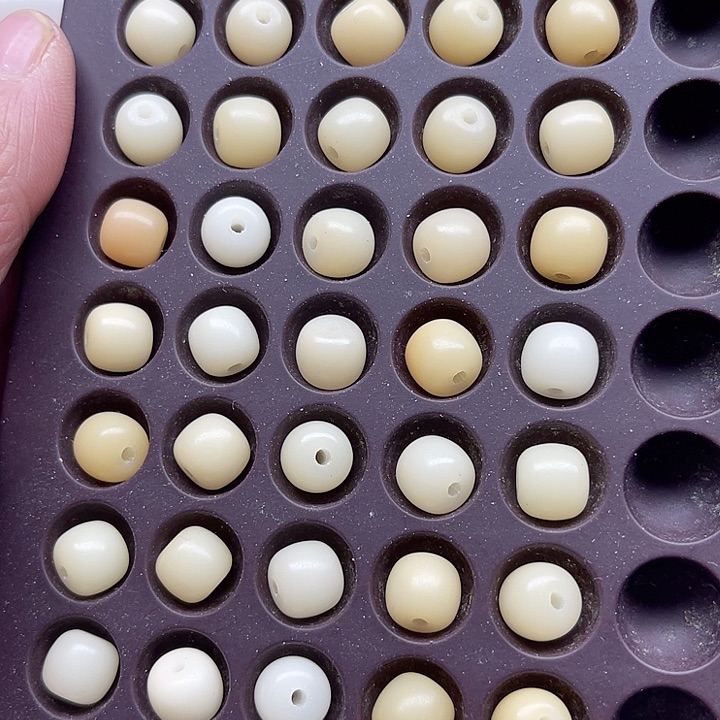 白玉菩提吊坠精品10-9鸡蛋黄桶珠50颗