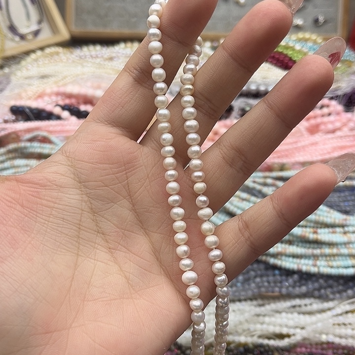 玛瑙/玉髓珠宝半成品未镶嵌5mm左右椭圆珍珠几颗有生长纹