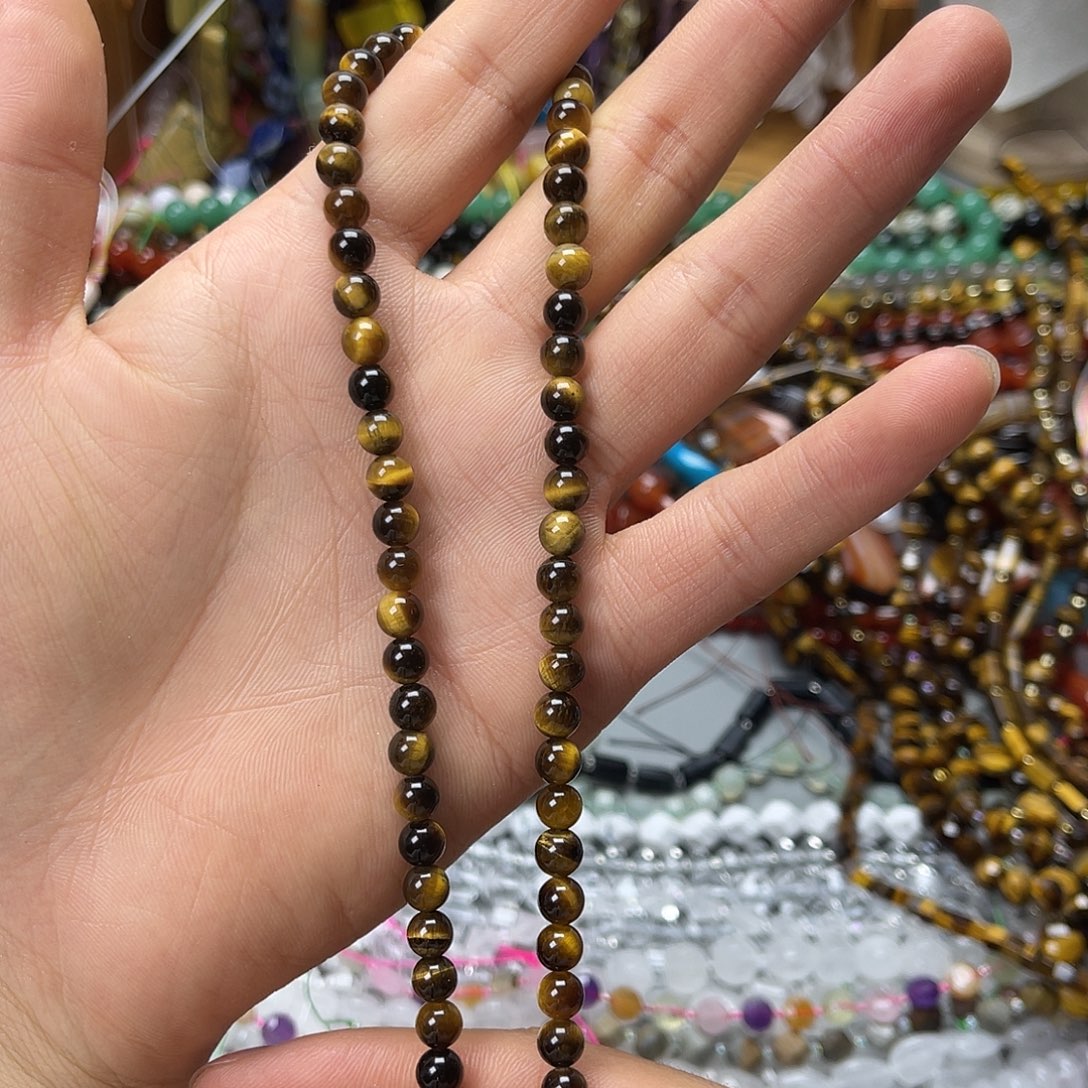 玛瑙/玉髓未镶嵌珠宝半成品卡6黄虎圆珠一条