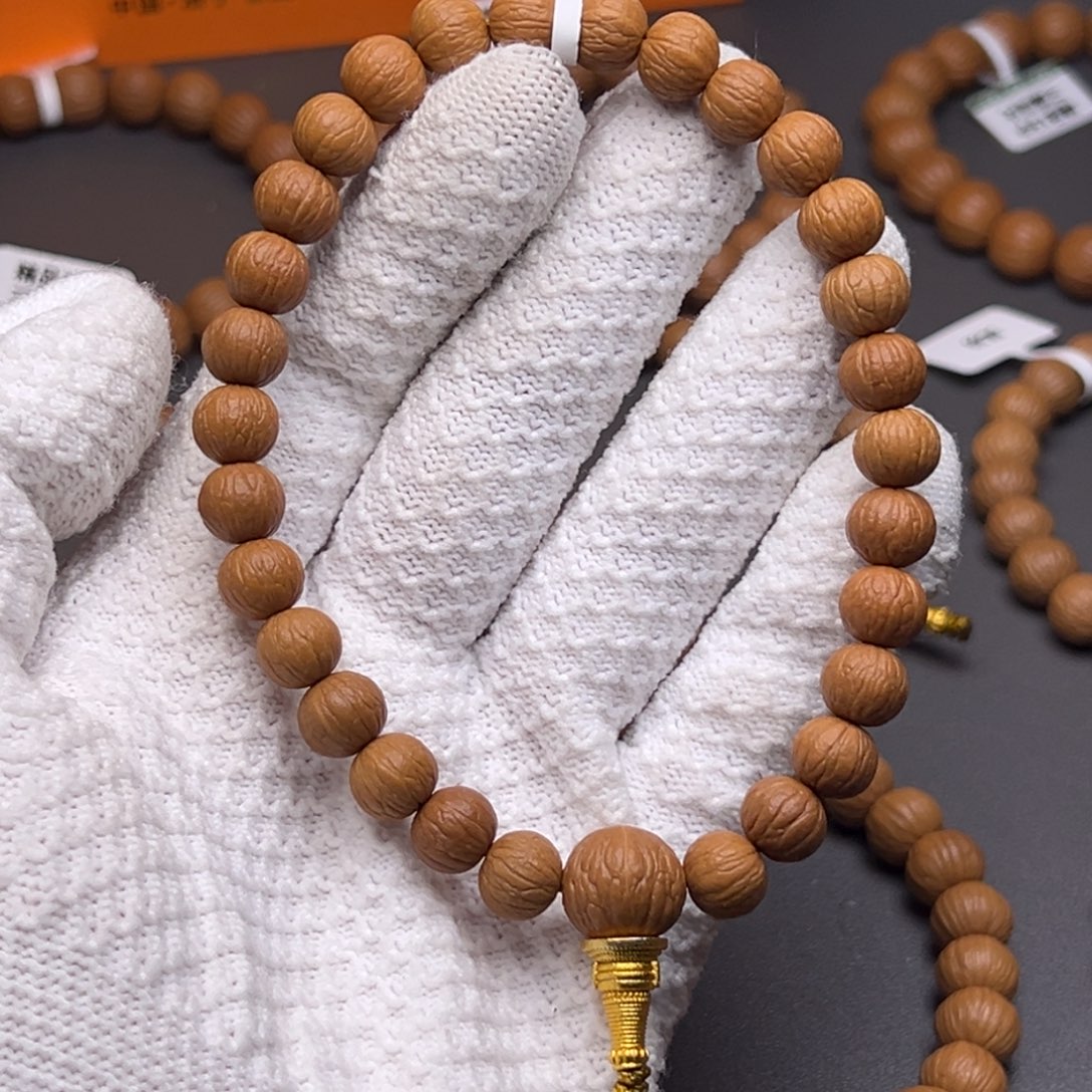 H****吊坠猴头核桃凤羽