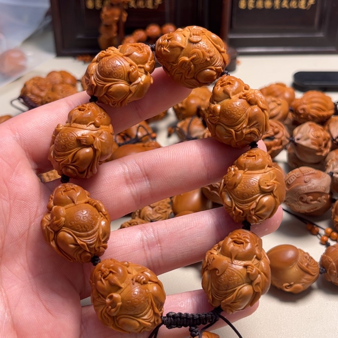 橄榄核吊坠u****8整身财神