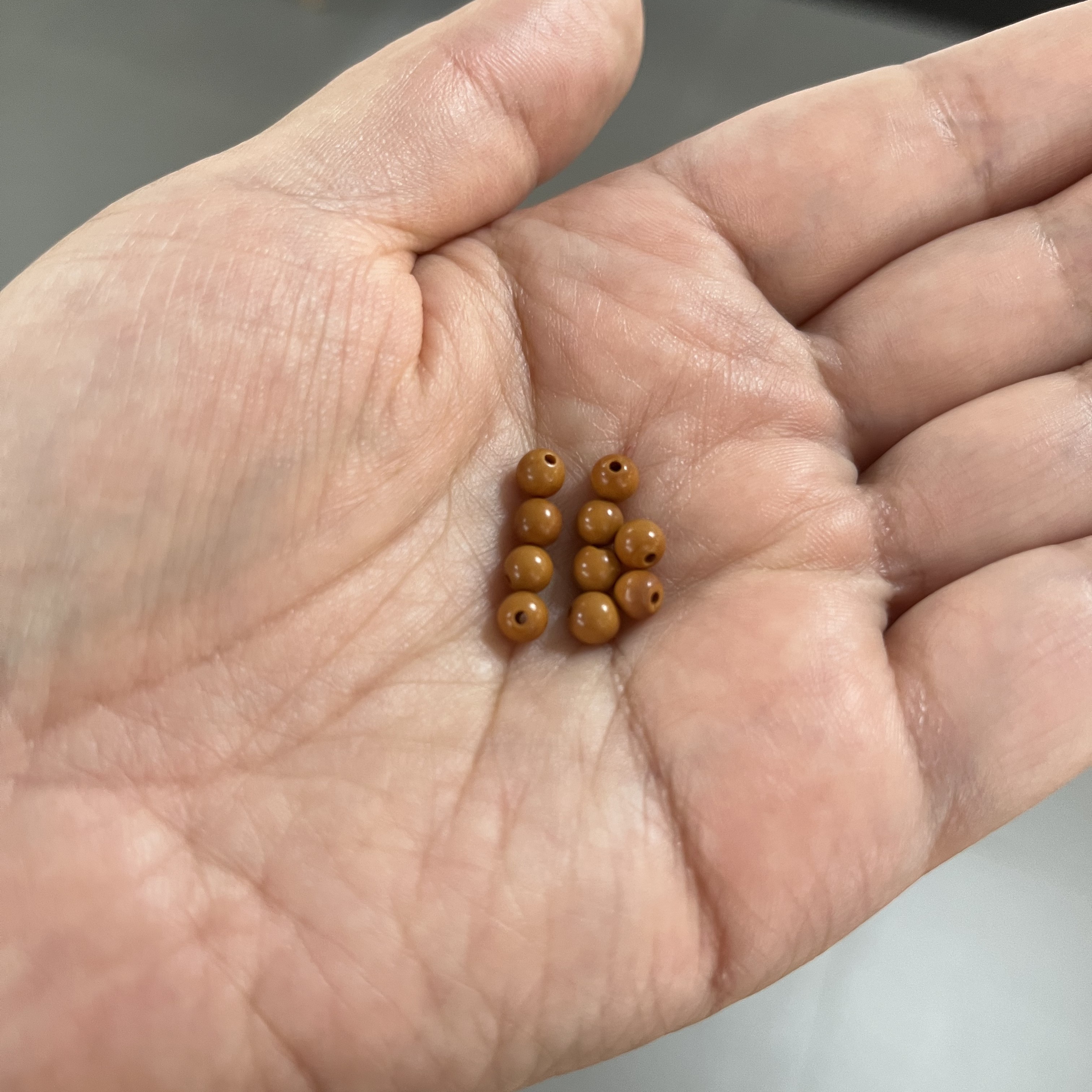 周派橄榄核隔珠隔片