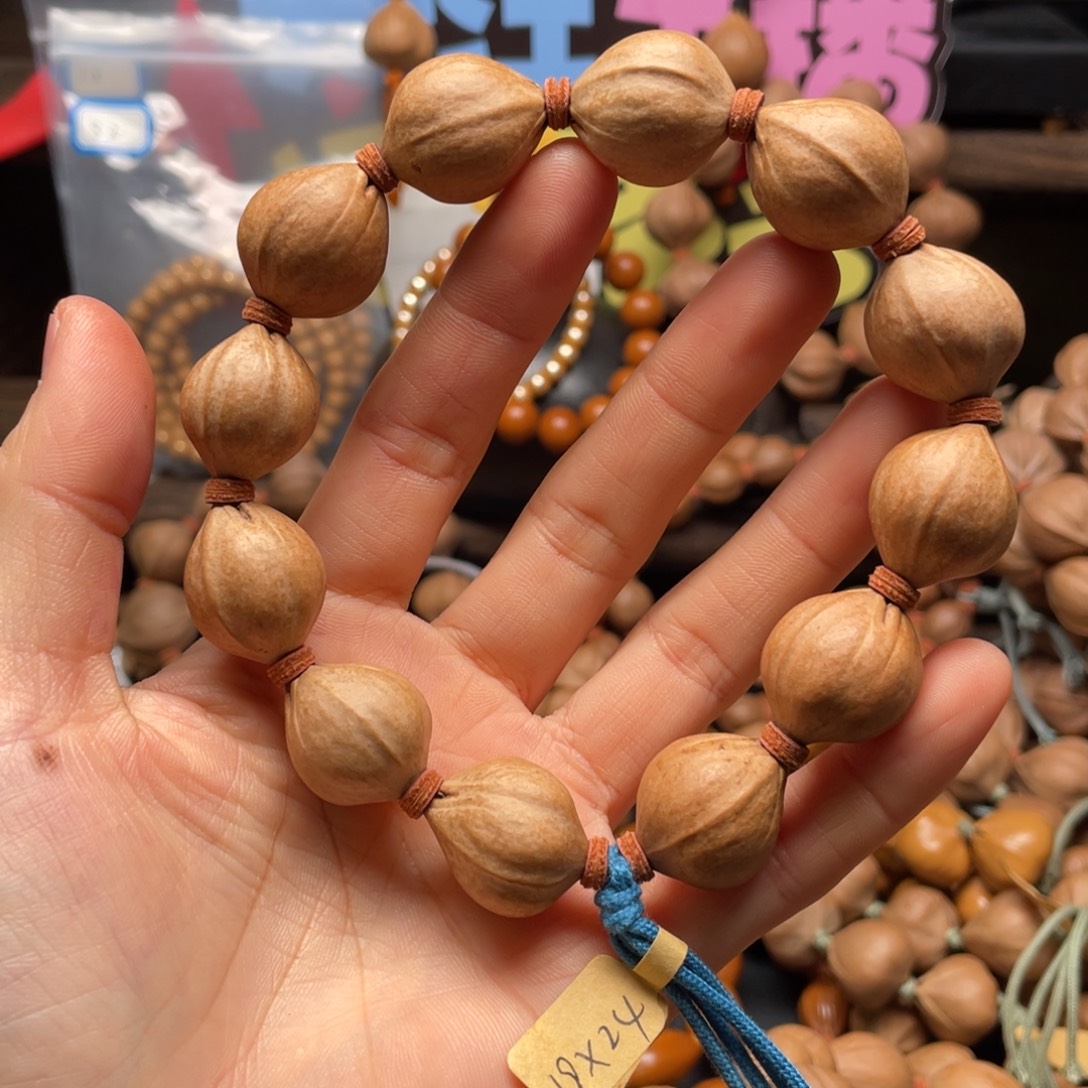 花***花橄榄核吊坠1924老料