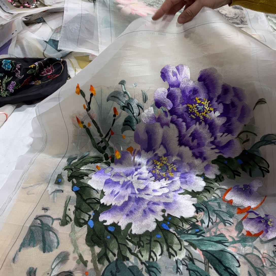 刺绣摩**子纯手工制作工艺制作