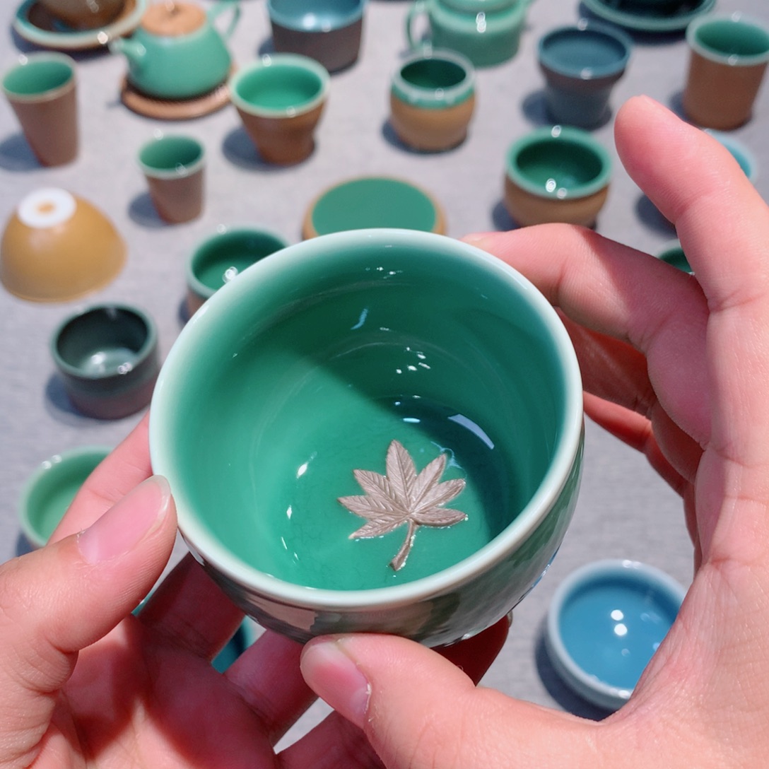 阳***月龙泉青瓷茶具杯子