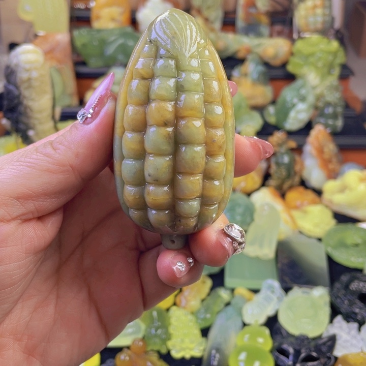 蛇纹石玉手把件合金