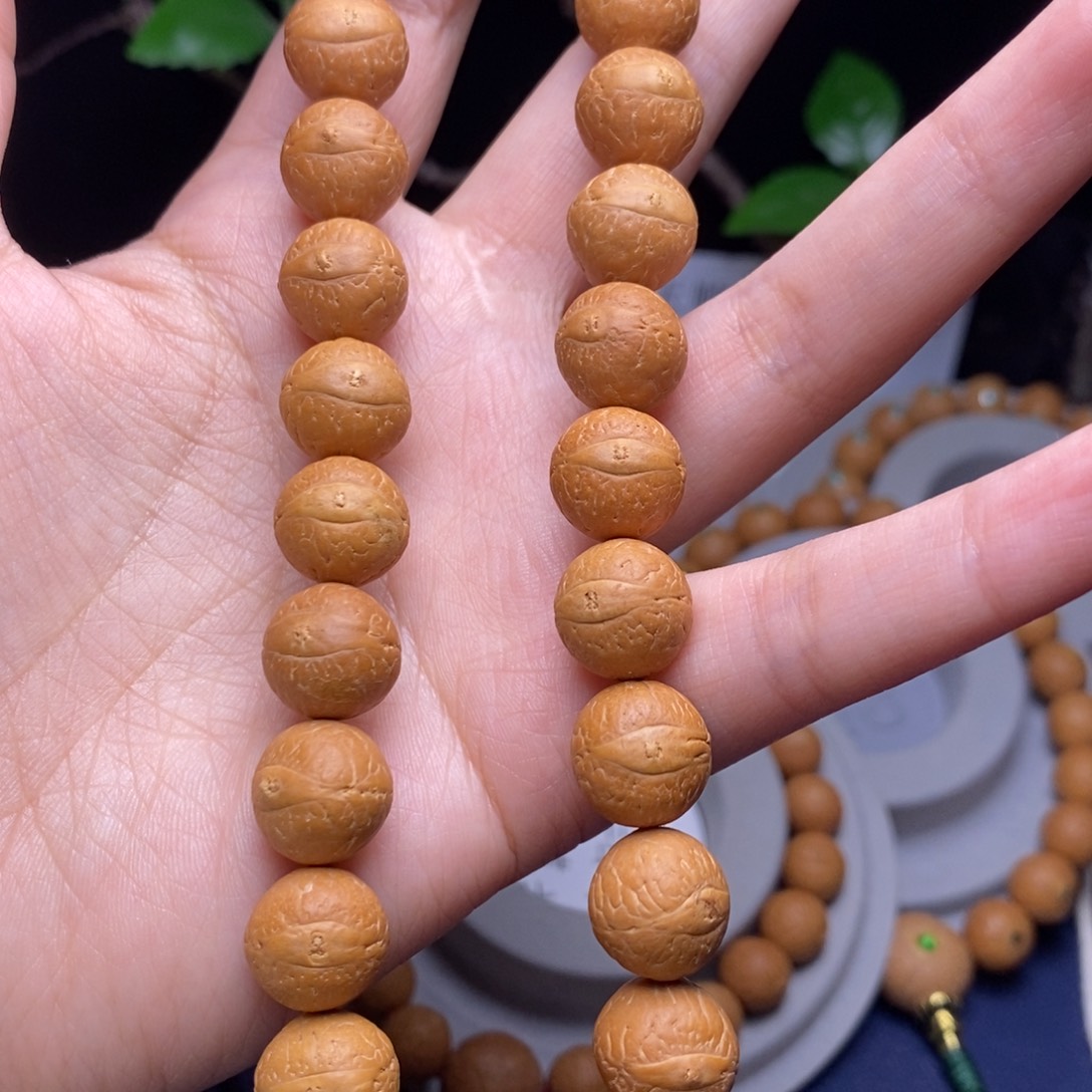 凤眼菩提吊坠12.5手持