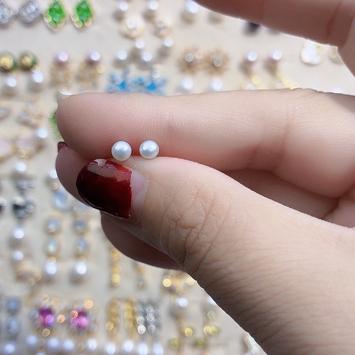 宋***宋淡水珍珠合金耳饰