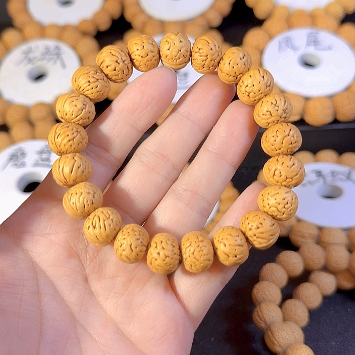 阿***良桃核吊坠纽扣桃核