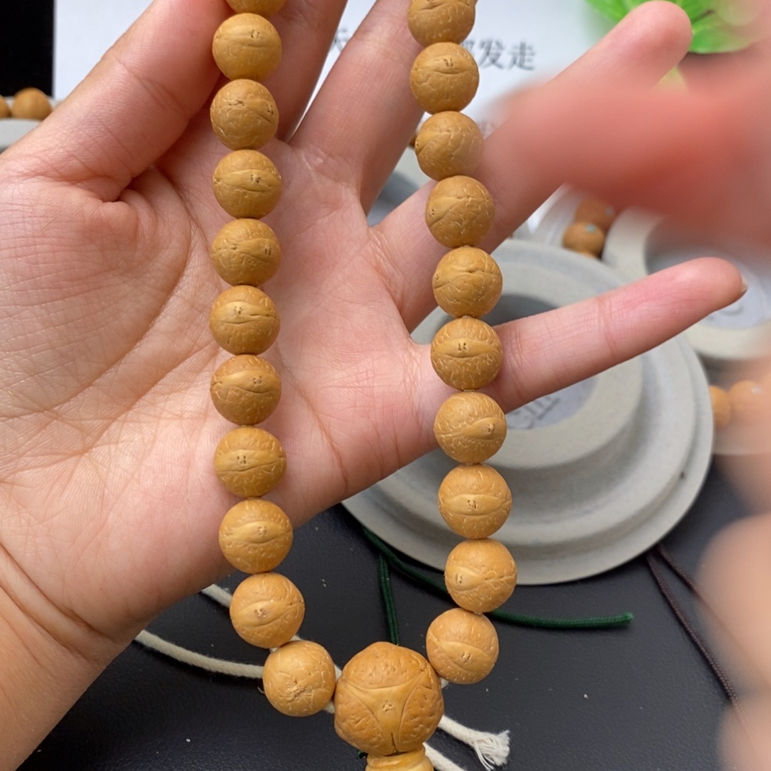 牧***之凤眼菩提吊坠12.5手持