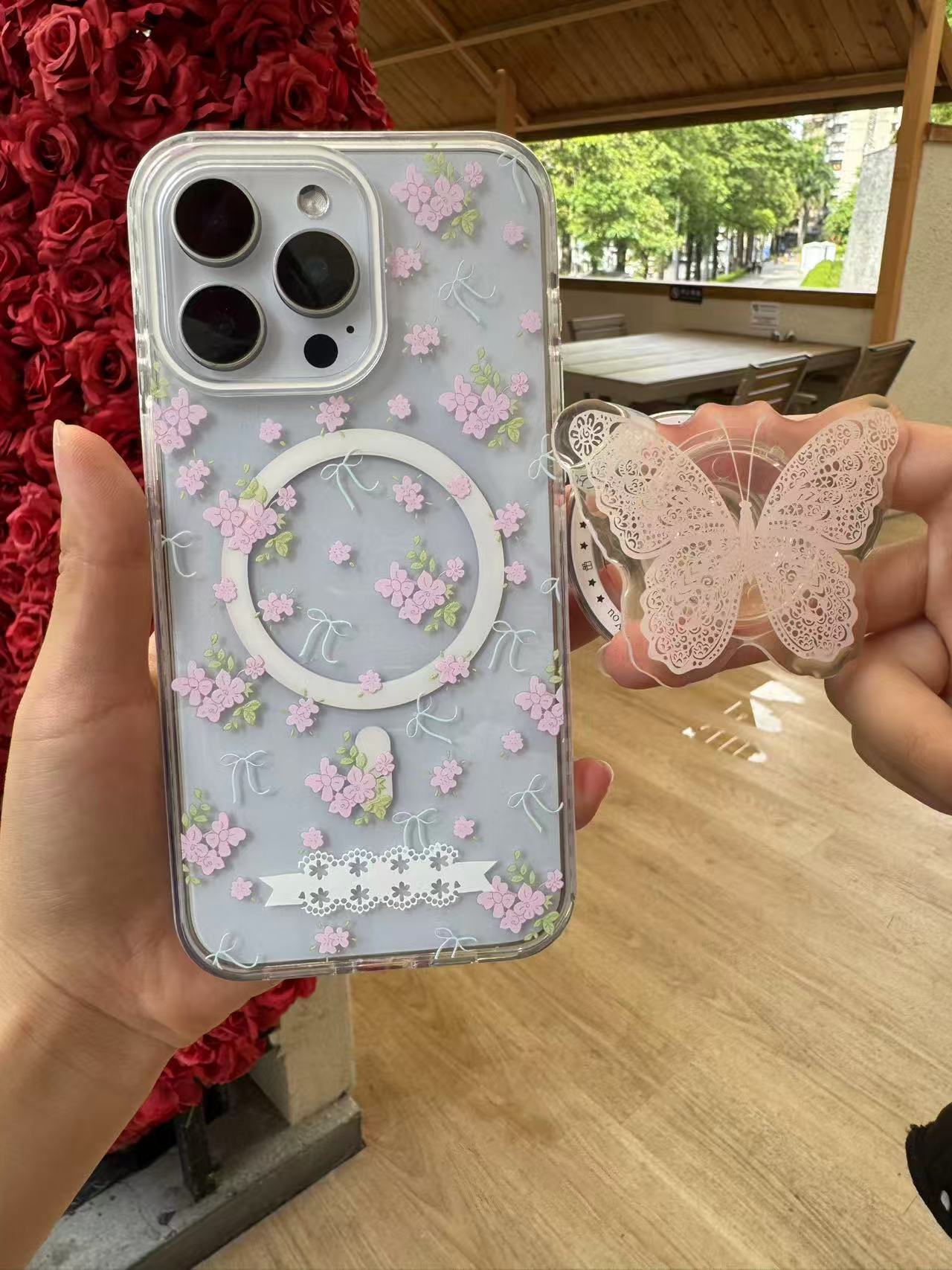 透明粉色花花手机壳蝴蝶气囊支架iPhone16promax全包防摔夏天苹果