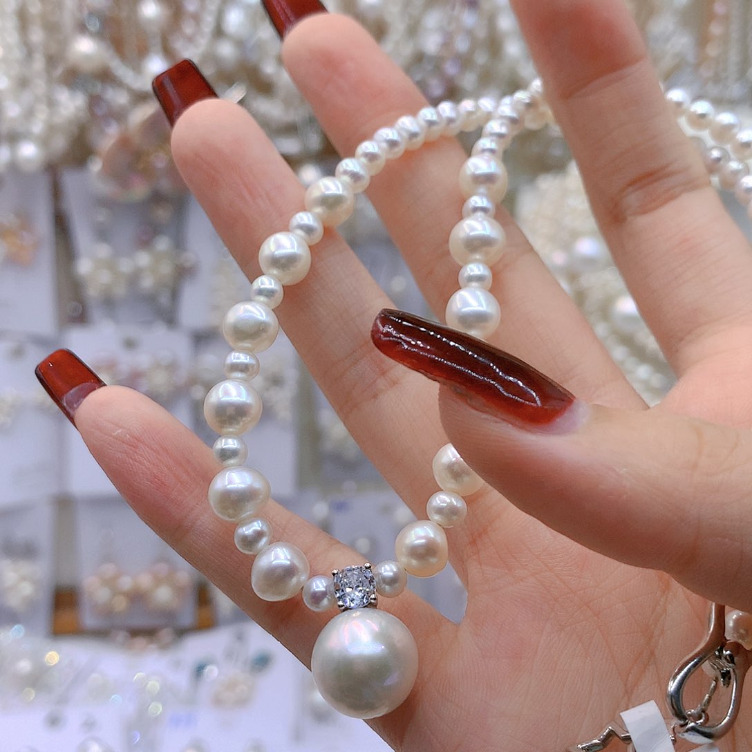 银S925镶嵌淡水珍珠耳饰吃****子