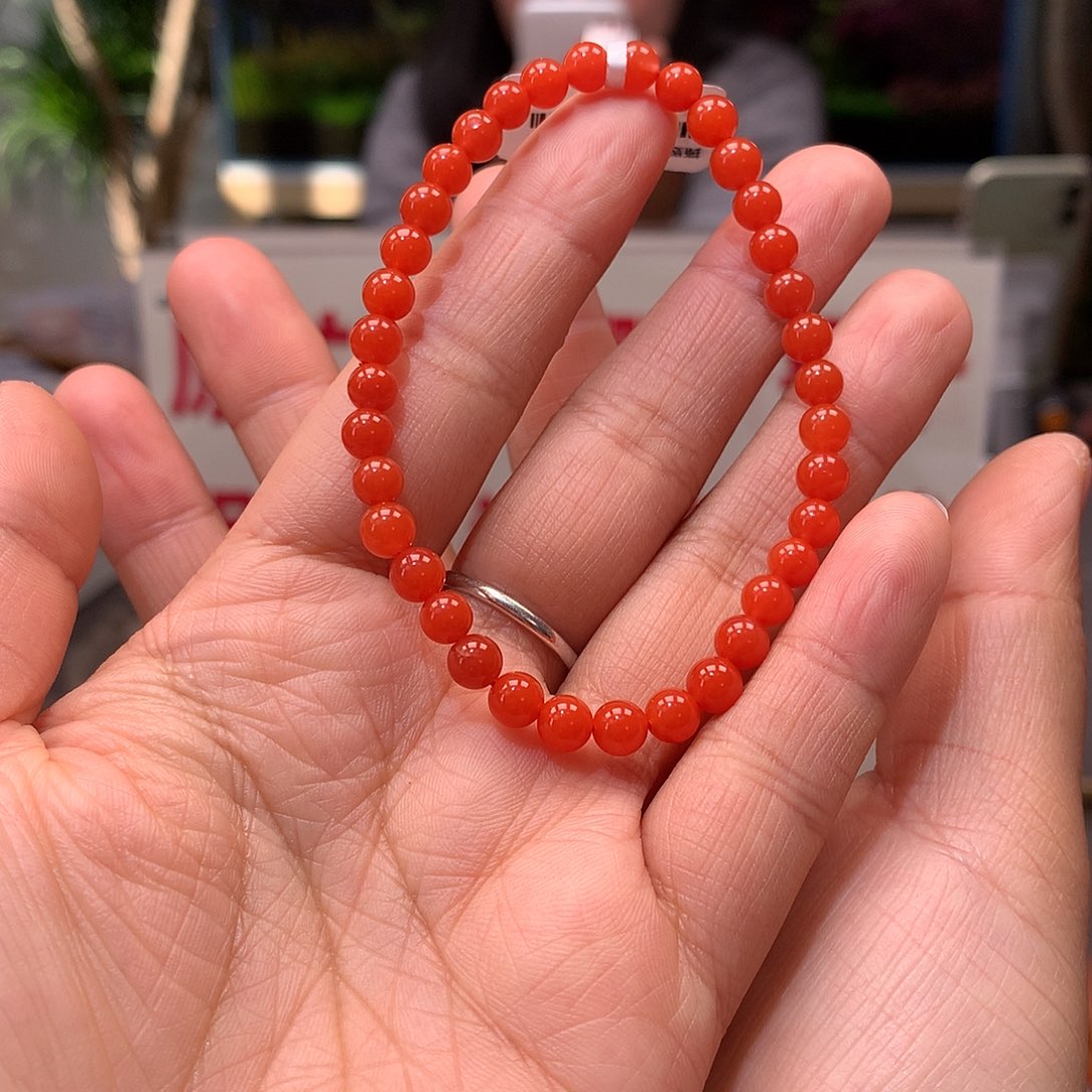 南红玛瑙5MM滴水洞柿子红手串未镶嵌