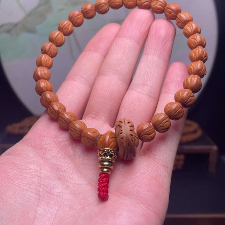 桃核手串9.5玉龙脊手持