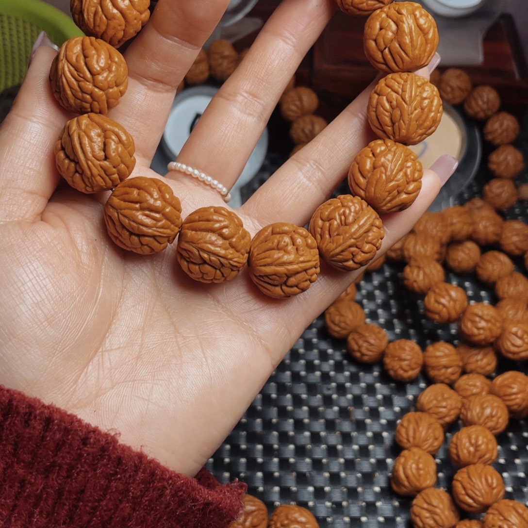 桃核手串找***名秦岭龙纹桃核