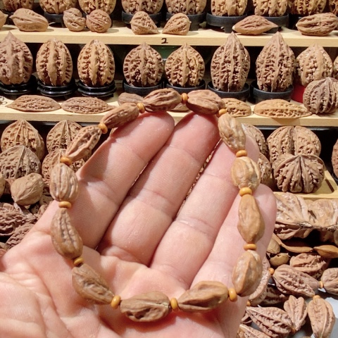 文玩核桃把件葡萄干手串