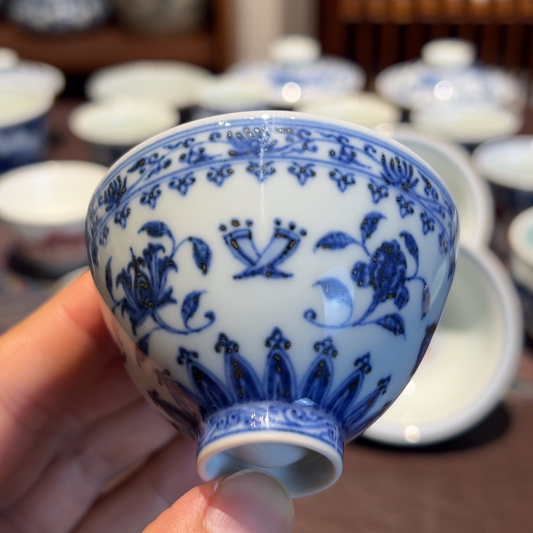 M***J精品青花杂宝内缠枝花卉鸡心杯口径约6.7厘米