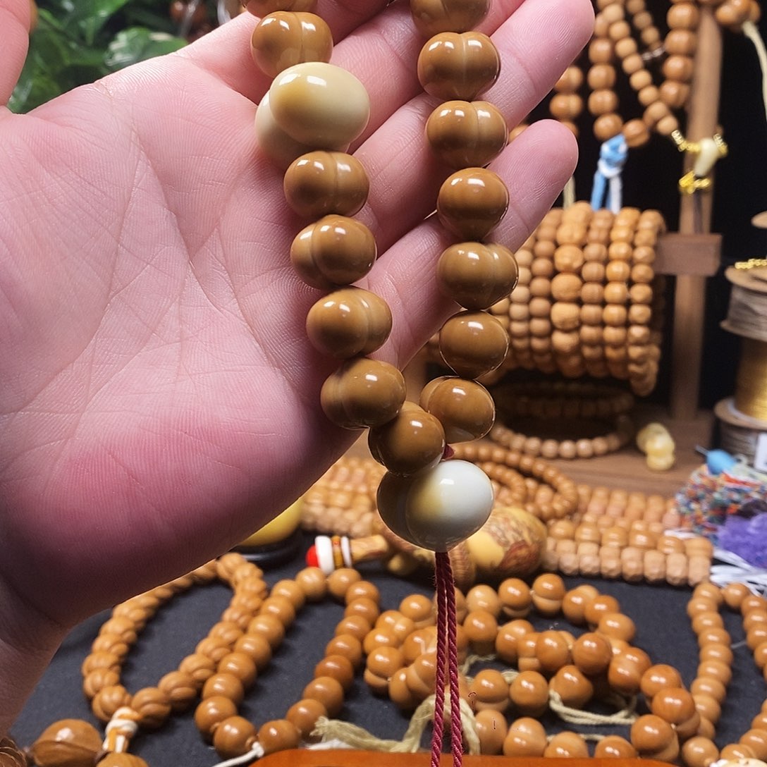 小***铺猴头核桃吊坠屁桃