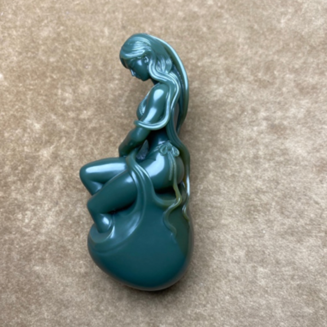 和田玉青玉海的女儿手把件