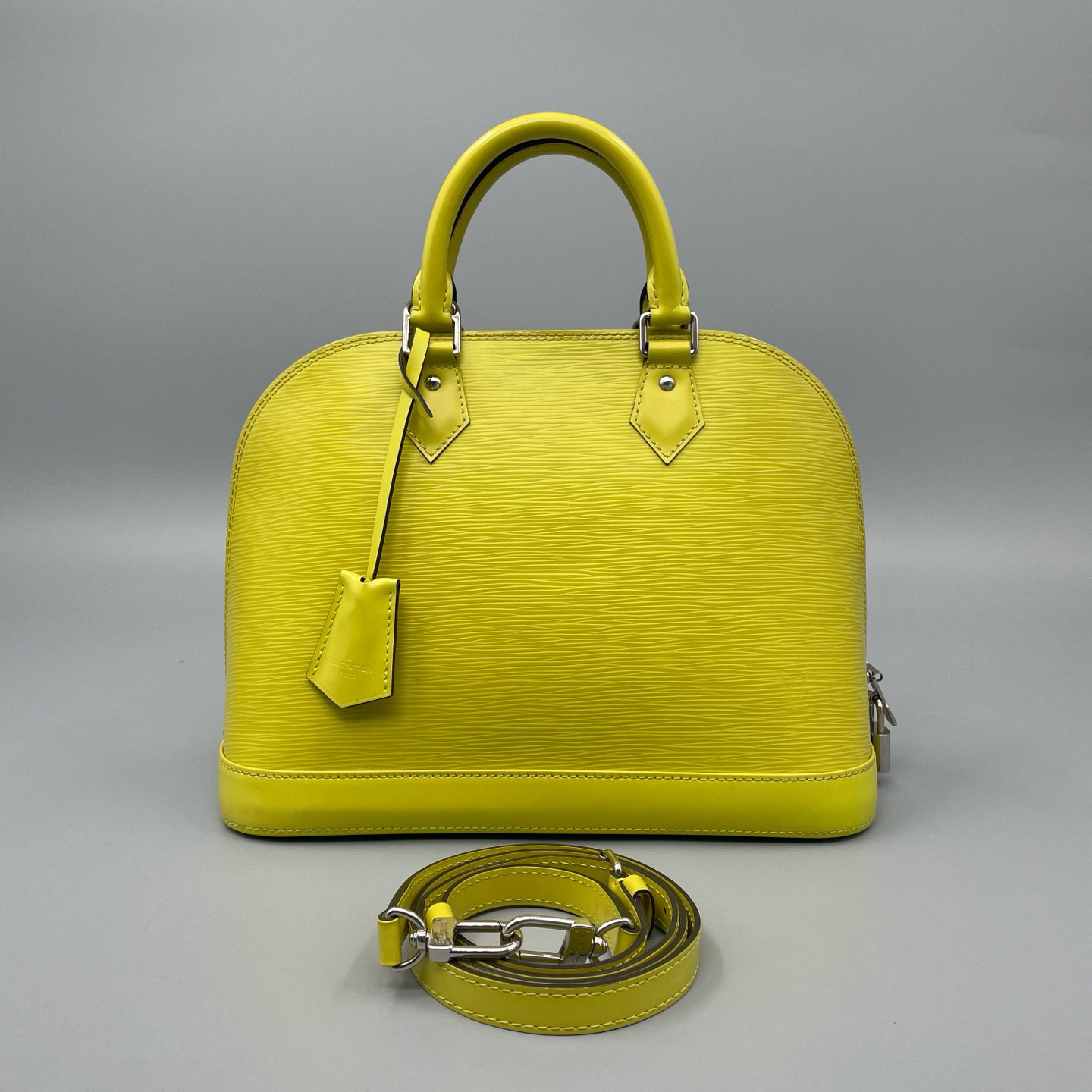 95新 LouisVuitton/路易威登 黄色水波纹贝壳14年尺寸31*24 A3075