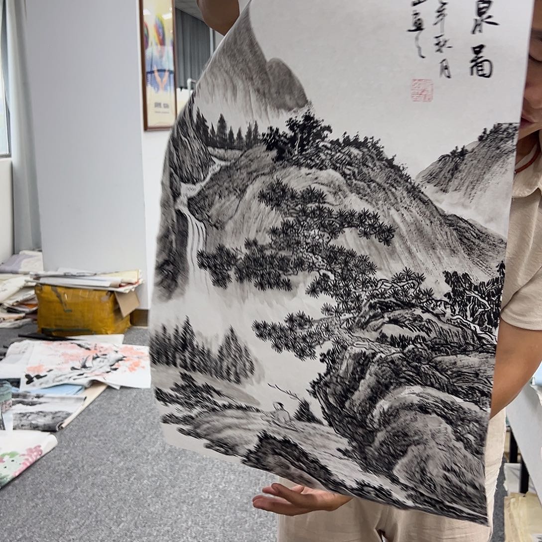 国画卖字画的小男孩