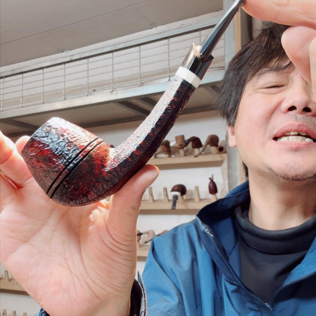 余*焦耀烟斗一牛头