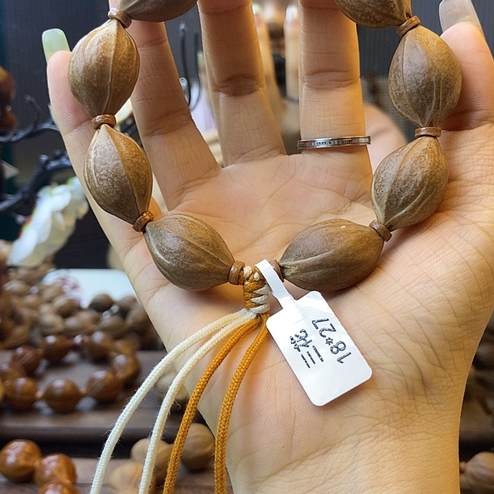 嗨***嗨吊坠橄榄核梅林铁核