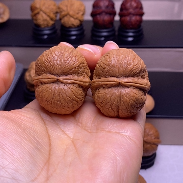 _***旭文玩核桃把件峭壁元宝25