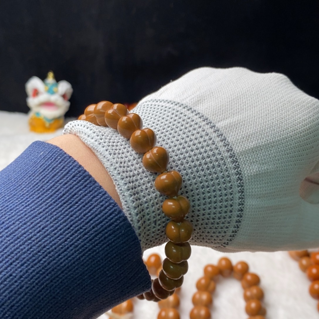 白***丁吊坠猴头核桃屁桃