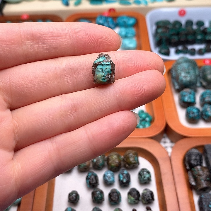 Y***i湖北天然原矿松石佛头