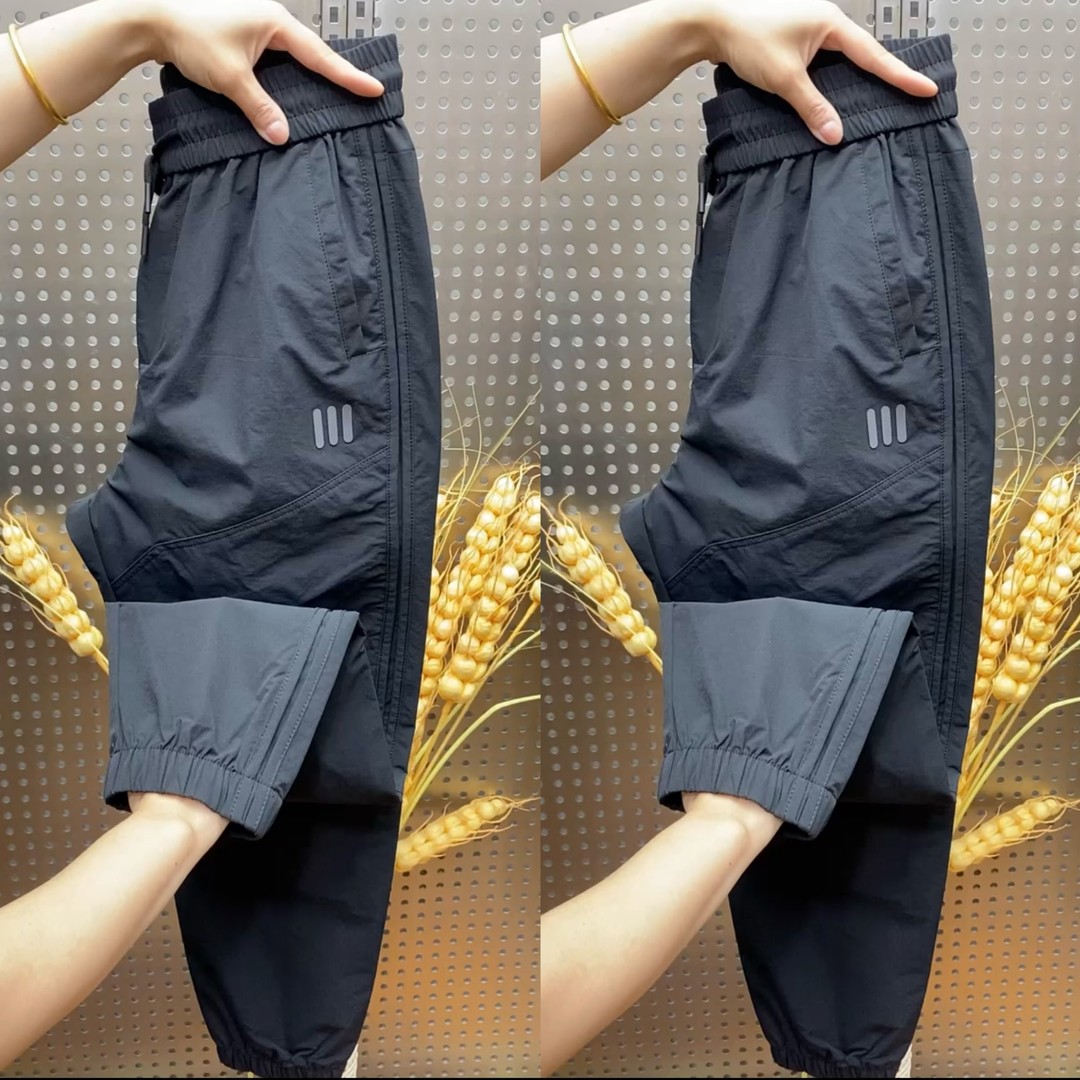 高档秋冬新款男士户外工装裤潮牌速干休闲裤松紧腰弹力黑色束脚裤