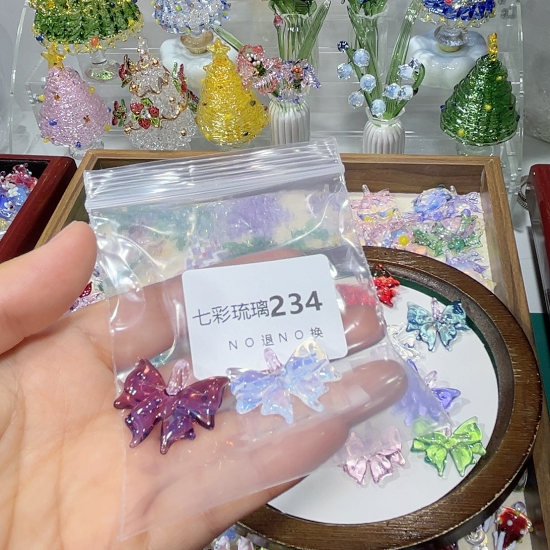 阿****玻璃颈饰234蝴蝶结两个