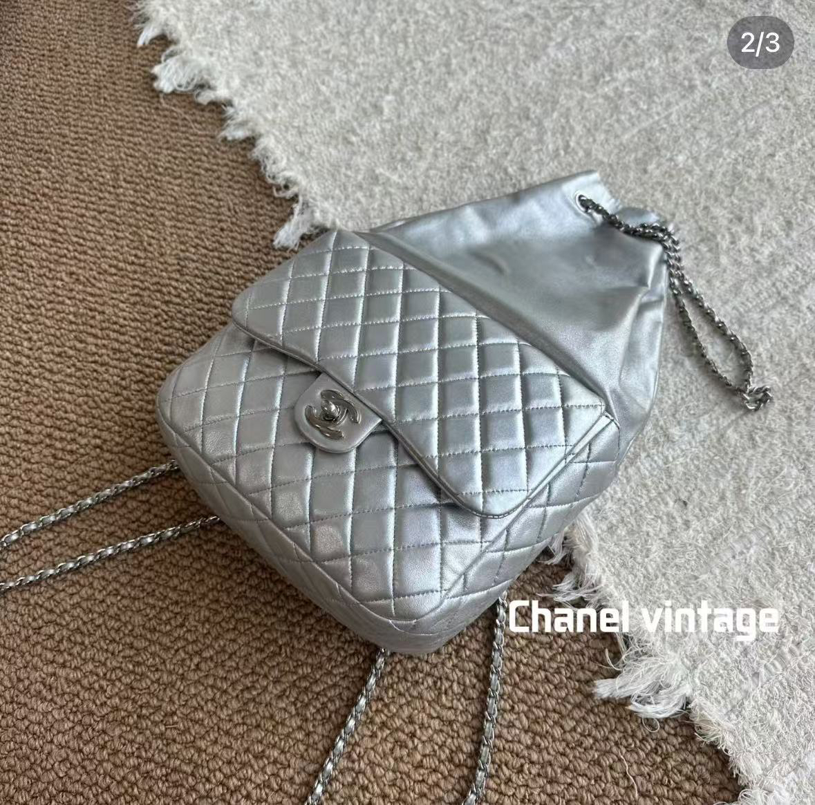 95新 Chanel/香奈儿 展会外场   束口银色双肩包