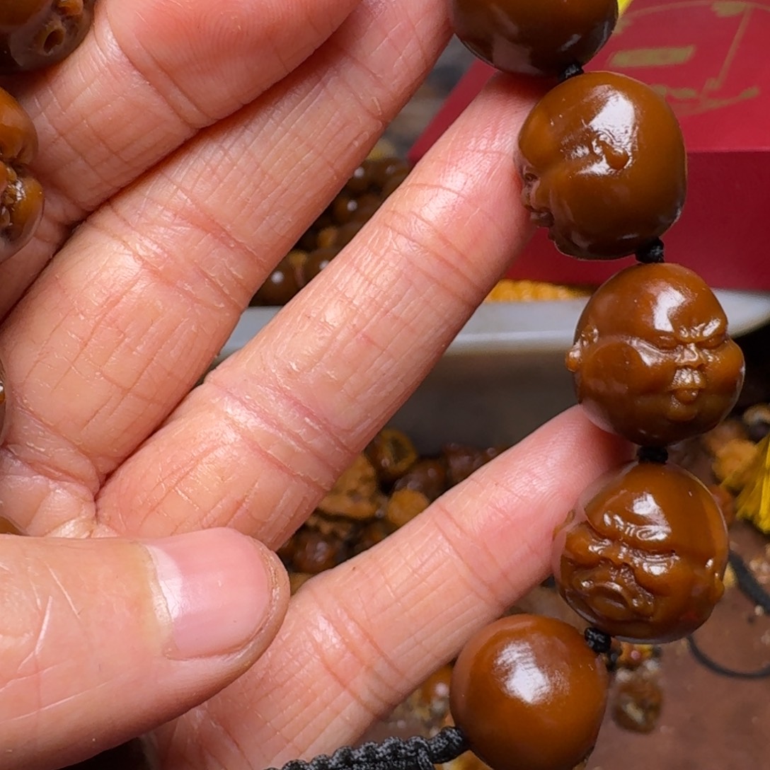 手串橄榄核你的电话