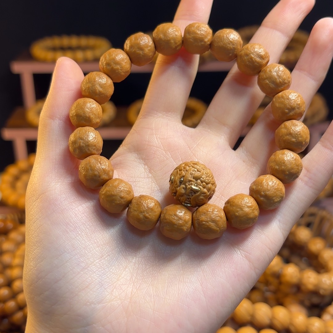 落****猴头核桃吊坠全品砂糖橘12mm