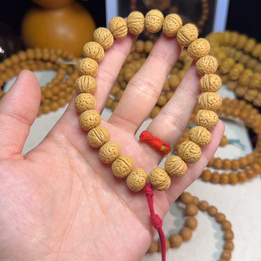 舒***飞吊坠桃核12X10东北野生桃核