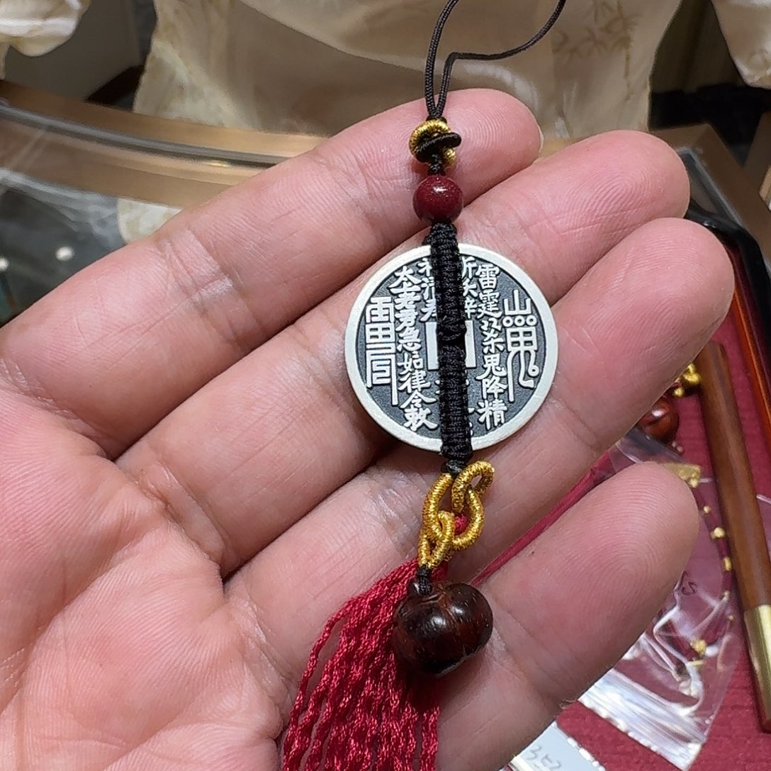 山鬼花钱带柿子挂件银的呦