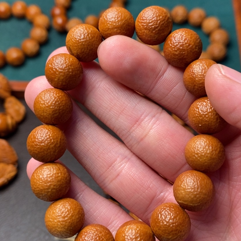 【闪购商品】橄榄核吊坠春**开橄榄核