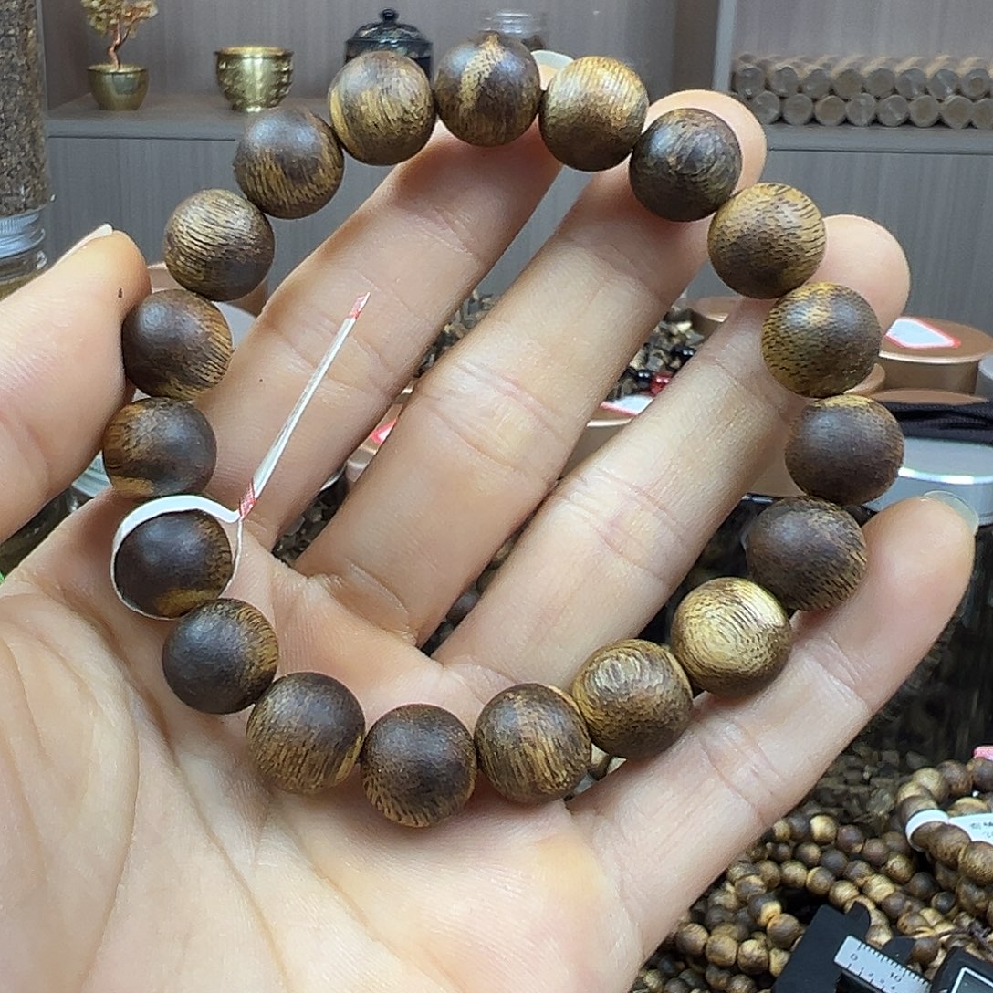 渠***头沉香沉香碎屑乌身圆叶品种卡1.1单圈12.5克