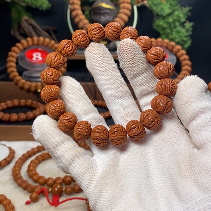 桃核吊坠松**剑秦岭龙纹