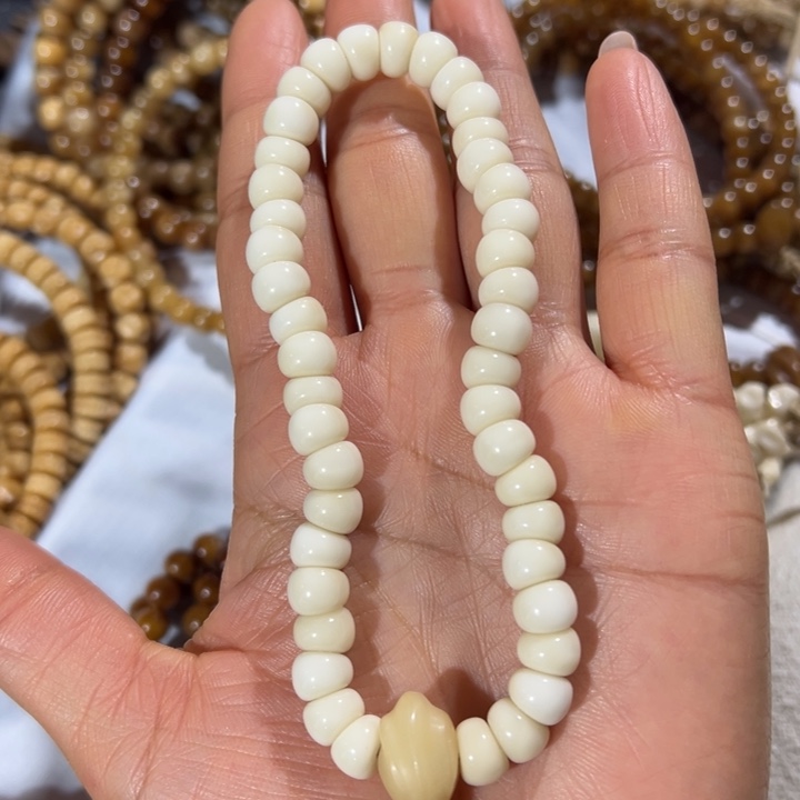 贝***壳吊坠龙脊菩提白龙蒜瓣手持