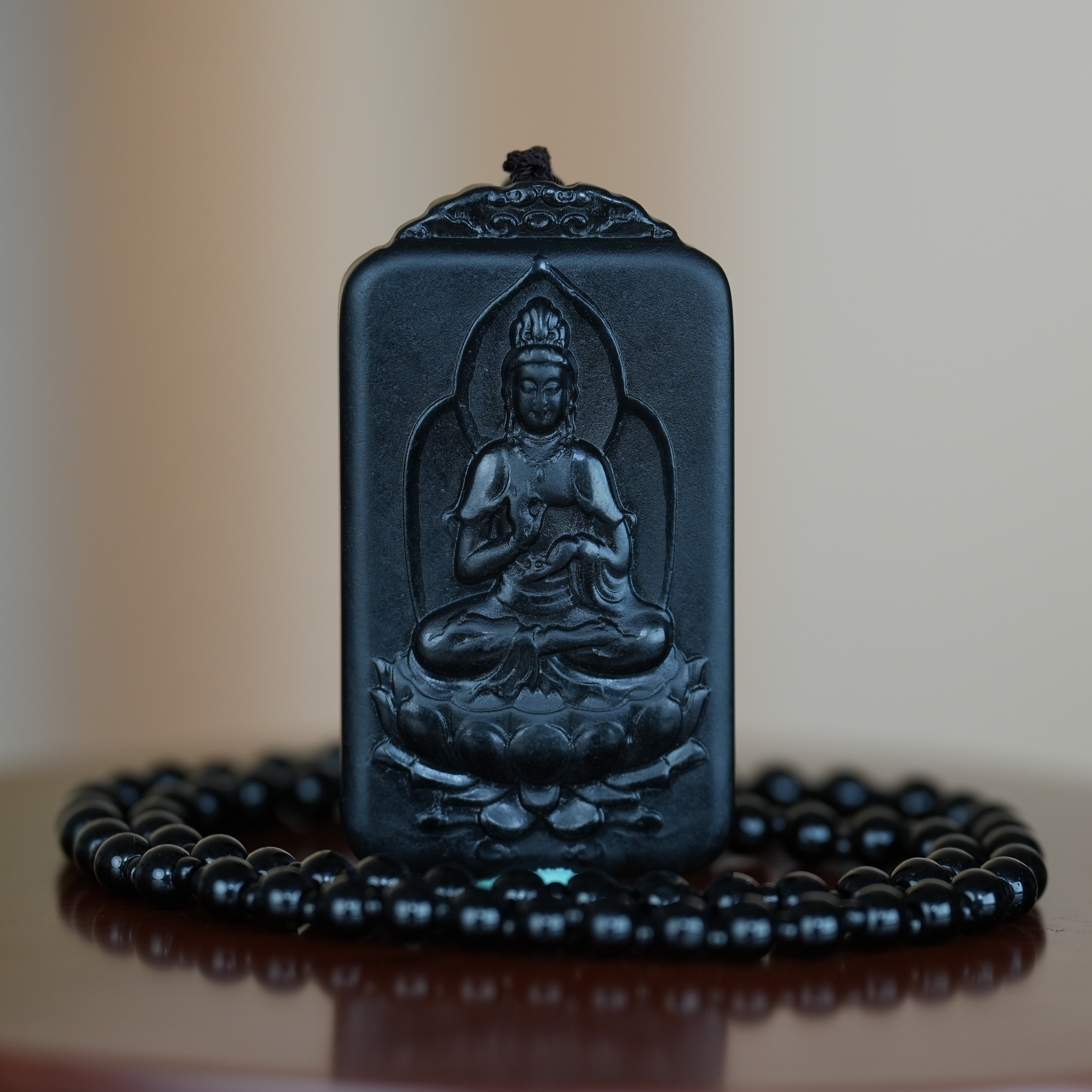 和田玉墨玉水月观音牌/XA1475中贸圣佳拍卖