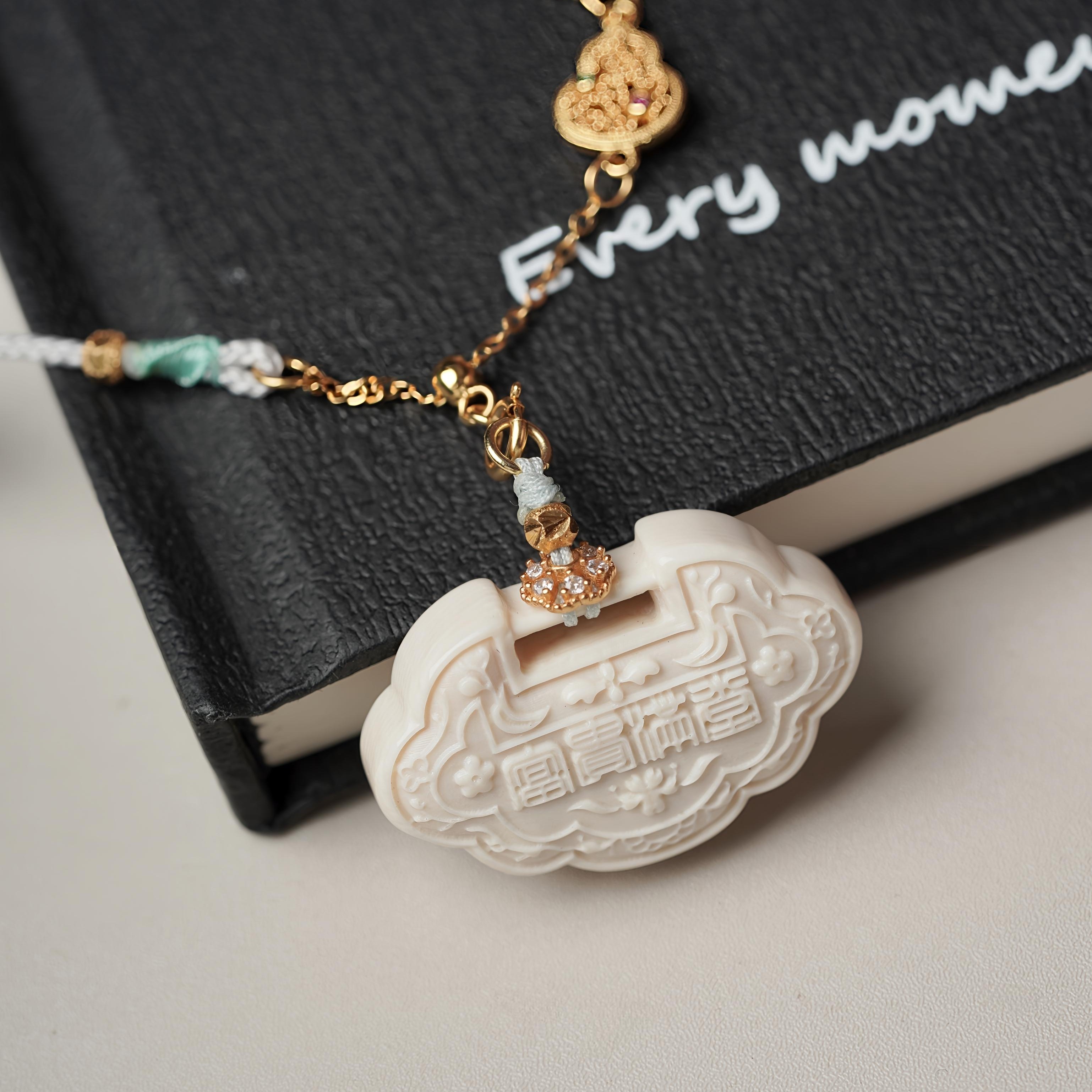 H13-61天然猛犸牙雕刻平安锁 约28.5x18x8.5mm一物一图 支持鉴定