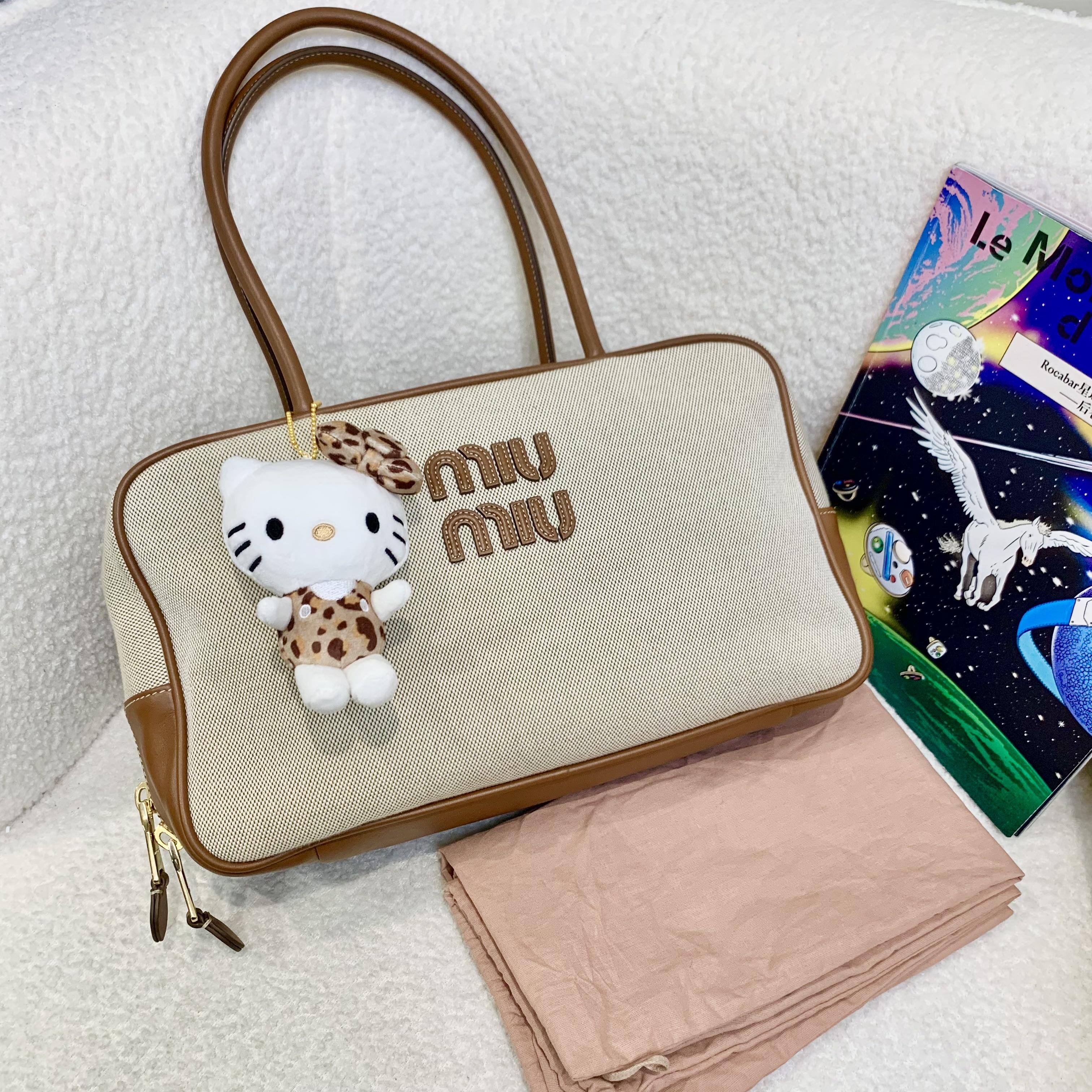 99新 MIU MIU/缪缪 壹臻/帆布拼皮公文包 68379124